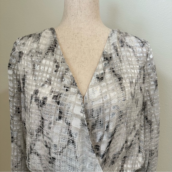 Stunning White House Black Market Silk Surplice Blouse with Fitted Bottom. - Picture 2 of 5